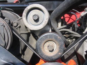 The tensioner pulley belt is usually attached to these arms which